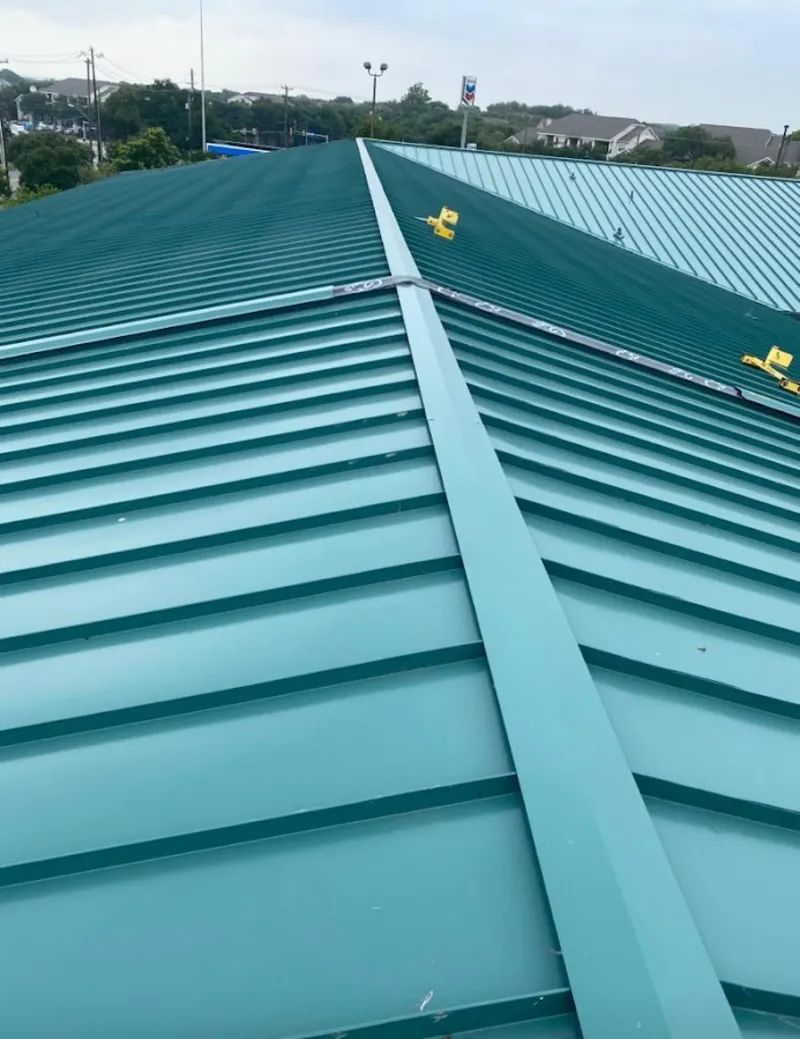 Green commercial metal roof ridge and valley for Metal Roof Repair in Midland